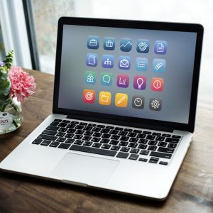 Laptop on a wooden table